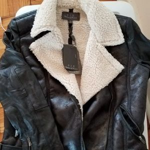 Brand New 100% black leather jacket.